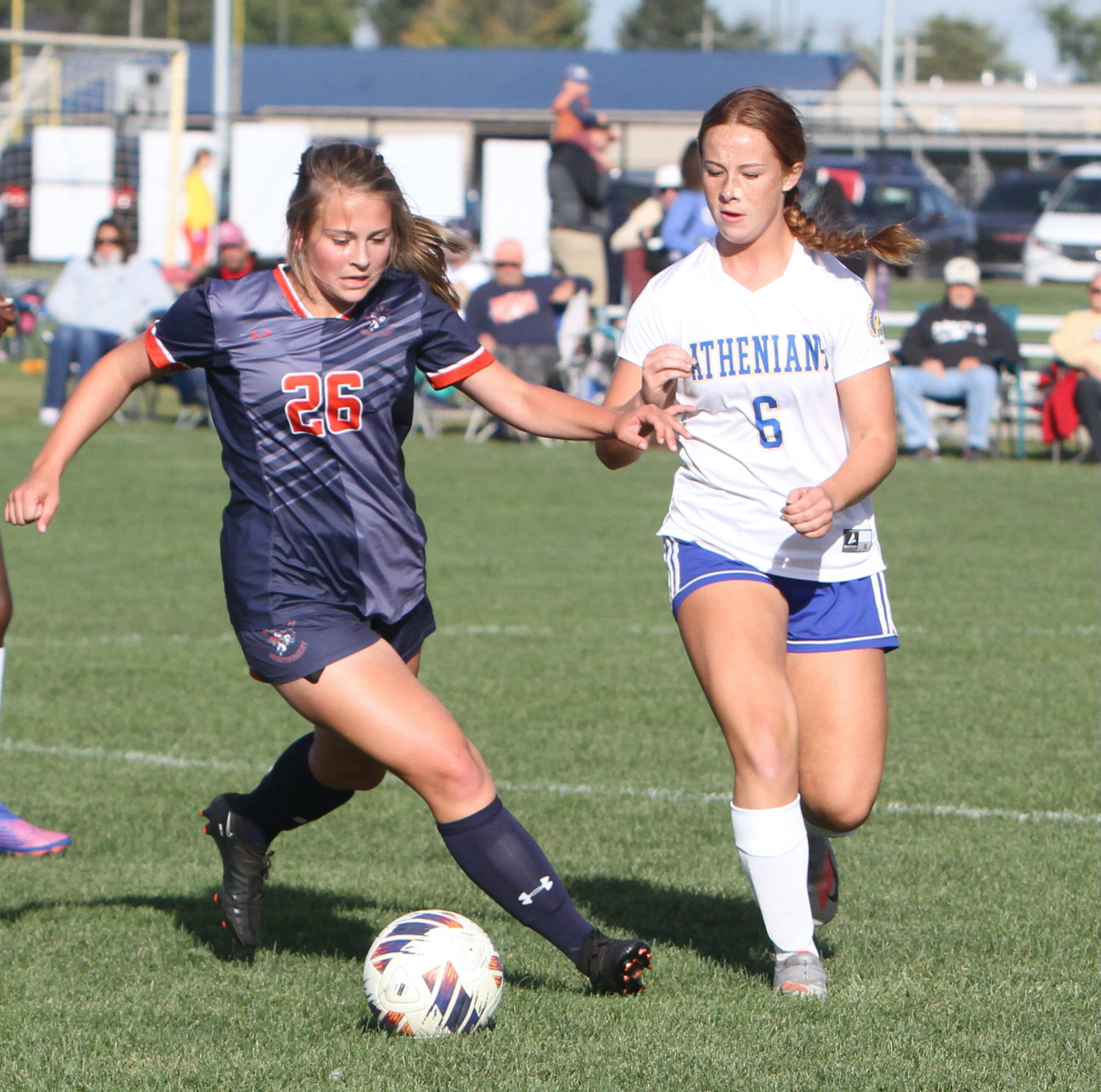 Celeste Moore of Crawfordsville and Kennady Sanders of North Montgomery battle for possession.